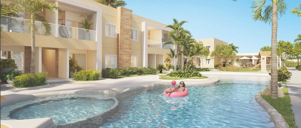 Vista ilustrativa da piscina de "areia" com prainha e SPA no Guarajuba Palm Beach, mostrando um ambiente tranquilo com uma mulher e criança flutuando em uma boia.